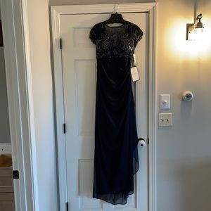Purchased as a mother of bride gown. Never worn. Tags still on.  Size 12.